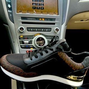 Brand new shoes  never worn too small for me brown and black with white sole